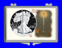 .gif of a 3x2 coin holder for a silver ragle dollar - xmas star theme