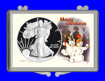 .gif of a 3x2 coin holder for a silver eagle dollar - snowman theme