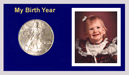 .gif of a Capital Plastic birty year silver eagle and photo coin holder